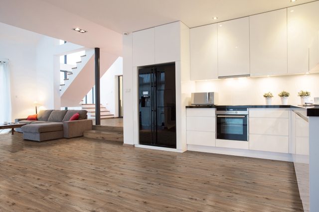MSI Surfaces LVP – Brown Fauna by MSI Surfaces, brown luxury vinyl tile flooring, shown in a room setting (manufacturer image)